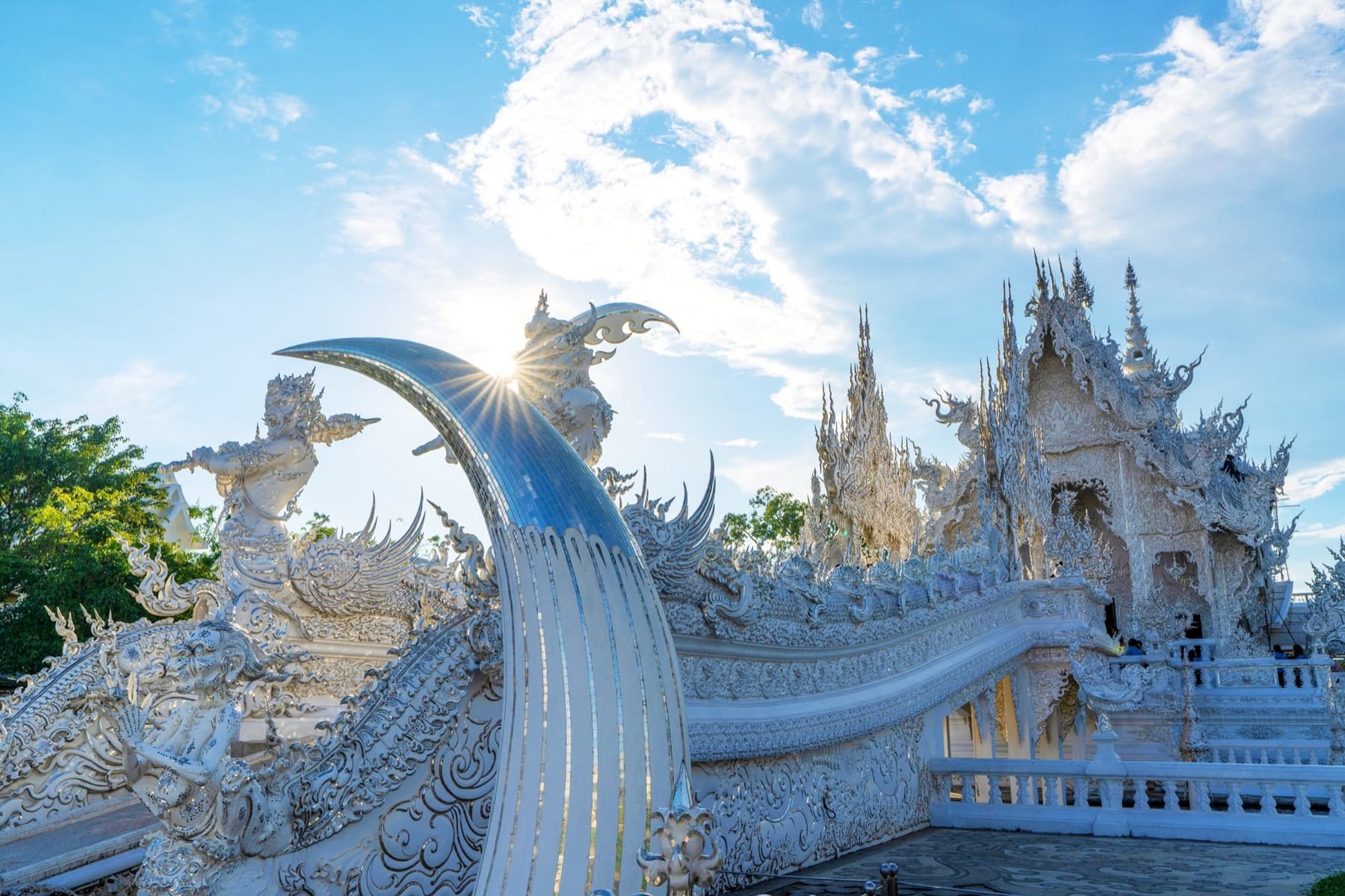 White Temple in Chiang Rai under a blue sky